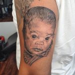 Portrait tattoo of baby