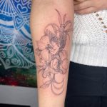Katrina floral cherub cross faith tattoo